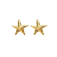 Beach-inspired gold starfish stud earrings with textured shine