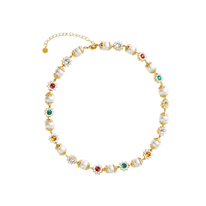 Front view of daisy pearl necklace showing multicolor CZ daisy stations and glossy glass pearls