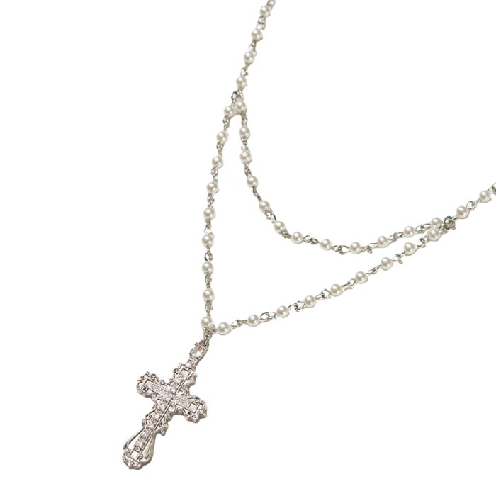 Everette Cross Necklace double‑layer pearl chain with silver CZ crystal cross pendant on white background