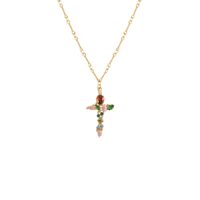 Iridescent Cross Necklace in 18K gold plated brass with multicolor CZ cross pendant on white background