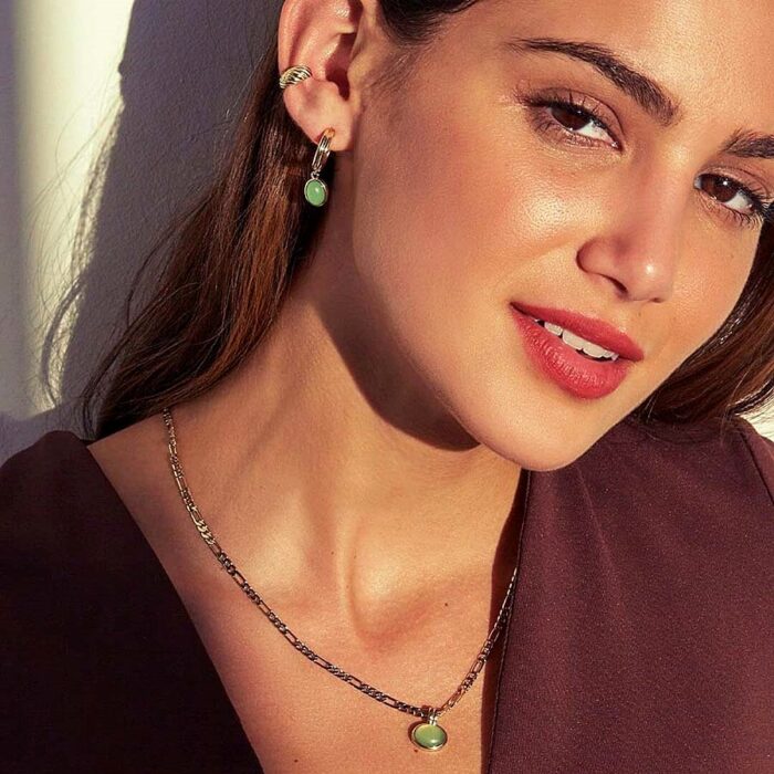 Layered ear stack with solitaire pendant charm hoops for everyday styling