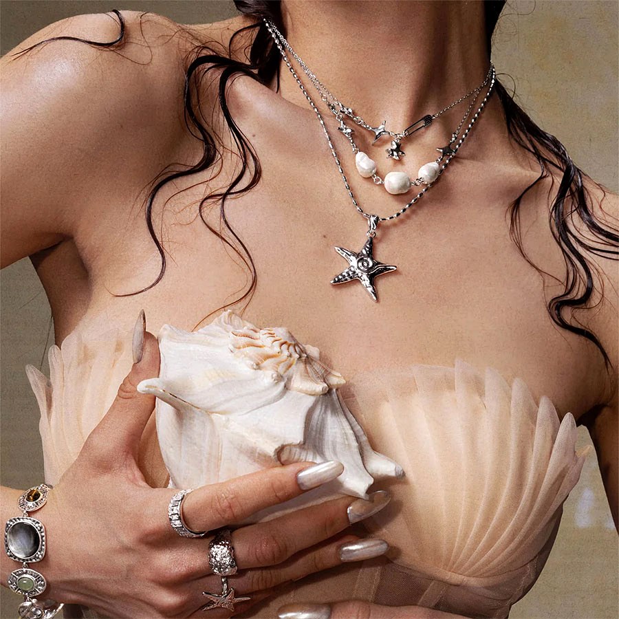 Starfish Necklace in Silver layered with pearls, Ocean-themed jewelry styling