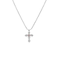 Platinum-tone Aphrodite Silver Cross Necklace featuring a vintage baroque cross pendant with red gemstone detail