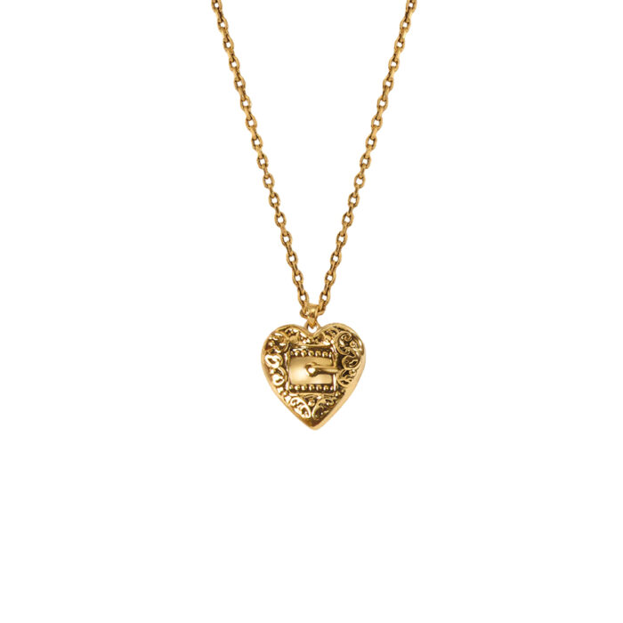Gold Belted Heart Charm Necklace heart pendant showing filigree texture and polished finish, white background