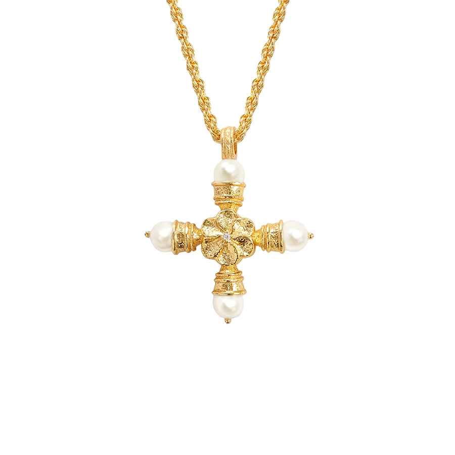  Close-up of Florence Cross Golden Necklace showing the textured gold cross, small center stone, and pearl caps