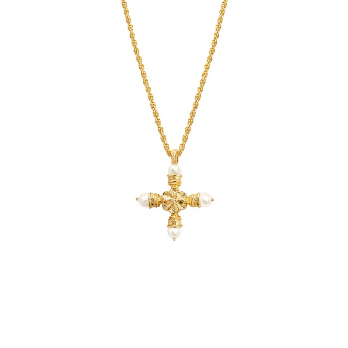 Studio shot of Florence Cross Golden Necklace highlighting the ornate gold cross texture and pearl tips