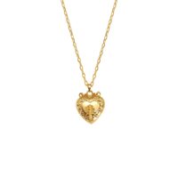 Vintage heart Isabela Photo Locket necklace gold-toned pendant with embossed floral crest detail