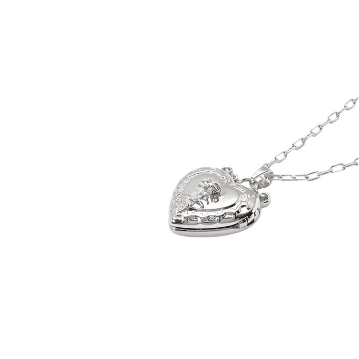Front view of openable heart locket necklace for photo memories, silver-tone jewelry product shot
