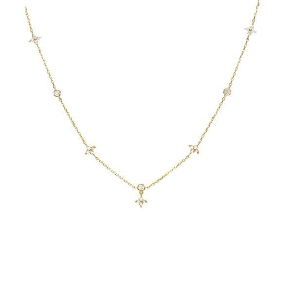 Lucky Clover Golden Necklace gold-tone station chain with CZ clover-floral charms on white background