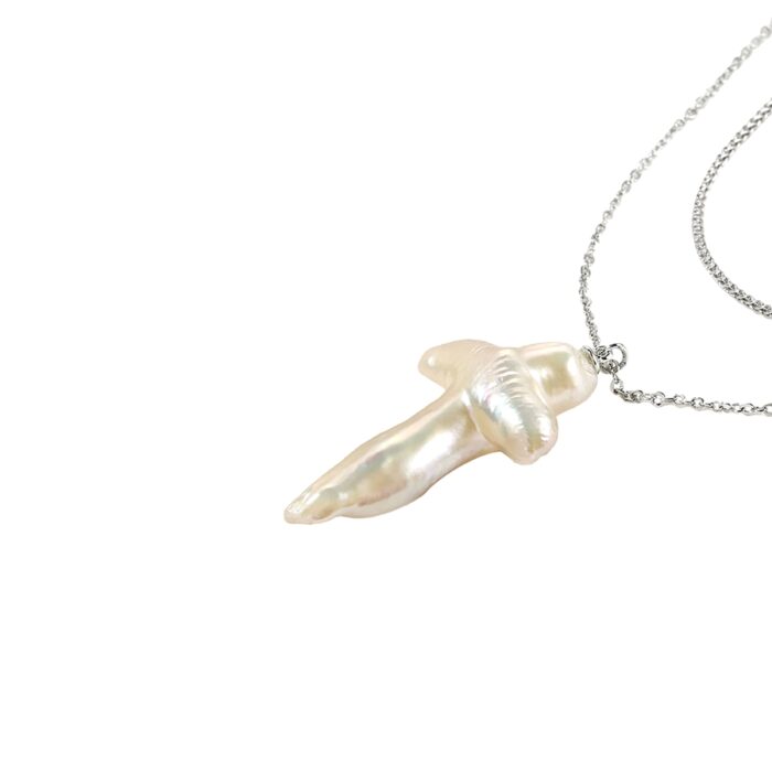 minimalist pearl cross necklace close-up—quiet luxury pearl necklace pendant for everyday layering