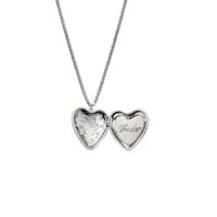 Openable heart locket necklace opened to show engraved bow inside and “Tender” script, silver tone on wheat chain