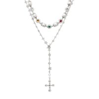 Silver Daisy Necklace Set layered rosary chain with cross pendant and pearl charms on white, clean girl necklaces