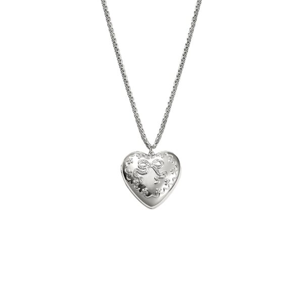 Vintage-style silver tender openable heart locket necklace that opens for a photo, embossed bow detail on wheat chain