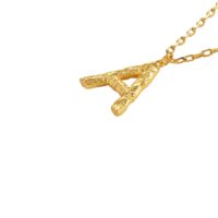 Textured Initial Letter Necklace with molten gold initial necklace “A” pendant on delicate oval-link chain, close-up