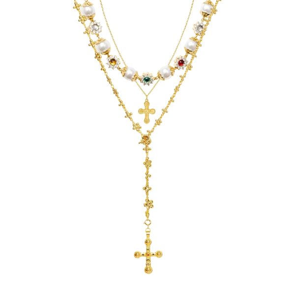 Urban Glam Golden Necklace Set gold layered cross necklace set with pearls and gemstone accents on white background