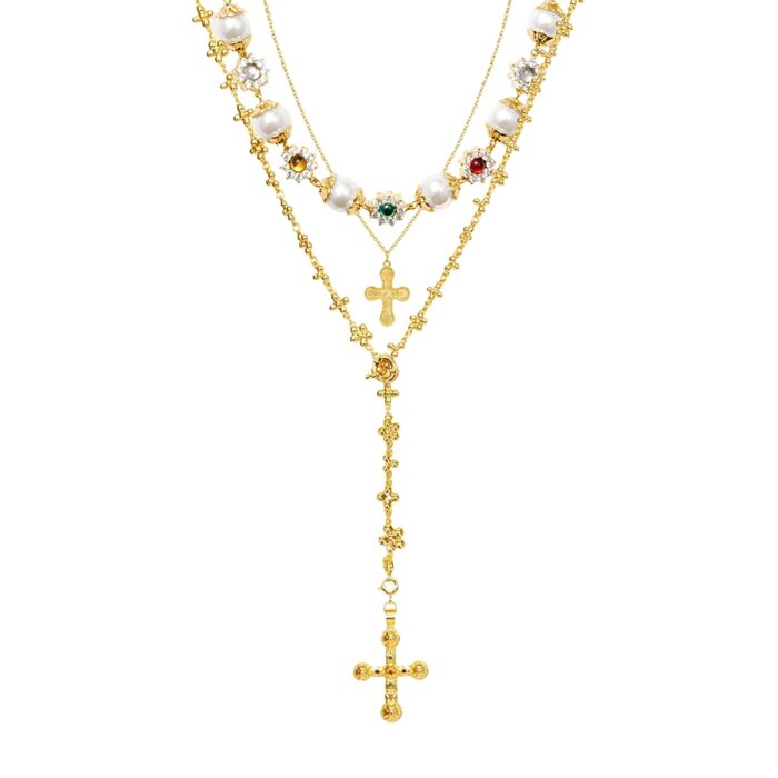 Urban Glam Golden Necklace Set gold layered cross necklace set with pearls and gemstone accents on white background