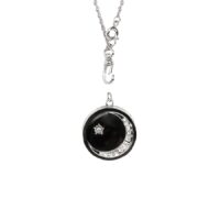 Detachable moon-and-star pendant necklace with black inlay and clear crystal accents on white background